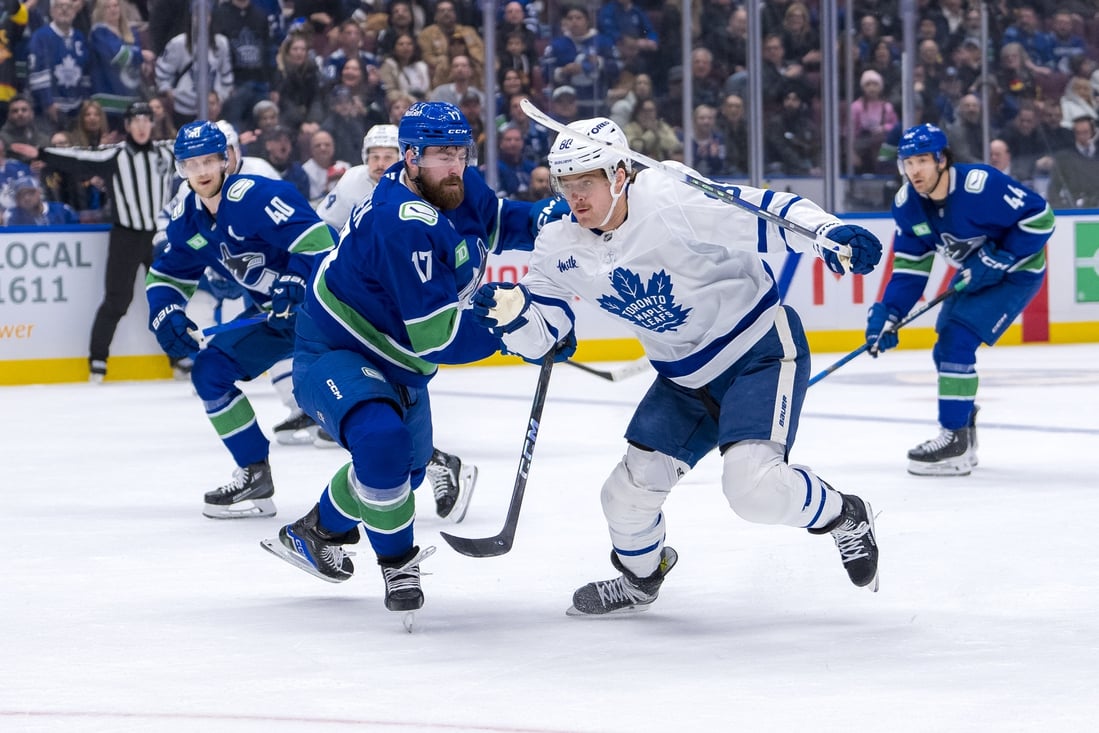 Maple afs player contesting the puck